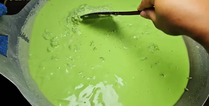 Add sugar (100g) and salt (1 tsp) to the sticky rice batter, and stir until smooth and sticky.