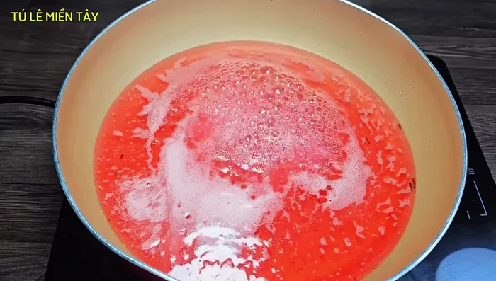 Add water to the marinated star fruits and bring it to a boil for 15 minutes. Then add the star fruit mixture and simmer over medium heat, stirring occasionally.