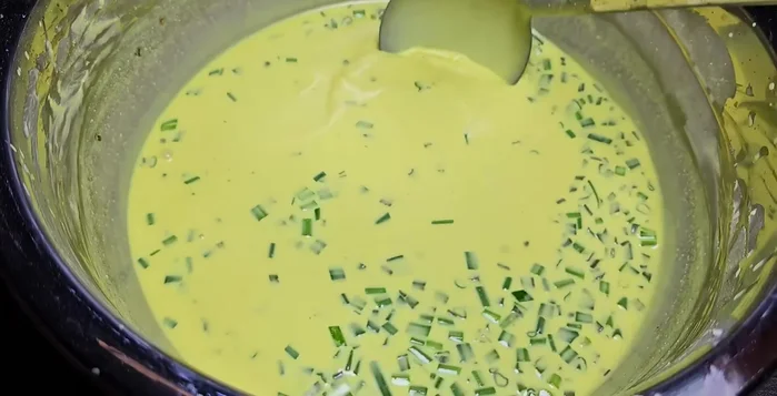 Stir the rested batter well.
