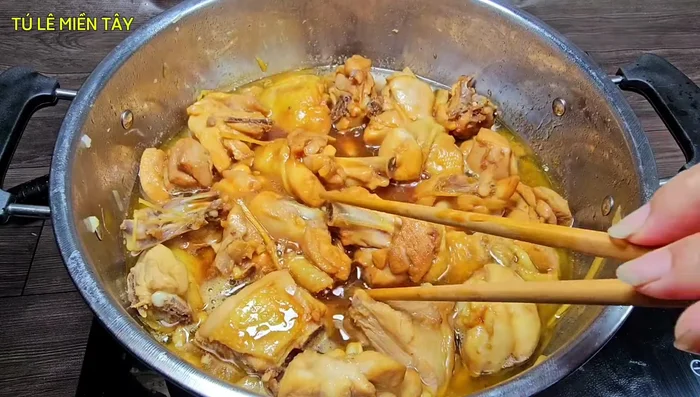 Occasionally turn the chicken while simmering.
