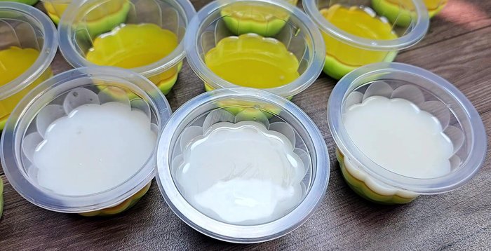 Pour approximately 18ml of the white coconut mixture over the coffee layer.