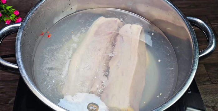 Boil pork belly: Add pork belly, cut in half if large, to boiling water with salt. Skim off foam. Boil for 35 minutes, or until a chopstick inserted comes out clean.
