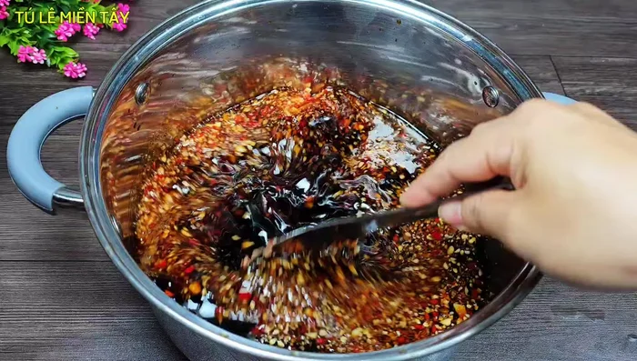Combine and Soak: Add the blended garlic and chili to the cooled soy sauce mixture. Combine the drained radish and the soy sauce mixture in a large basin or jar.