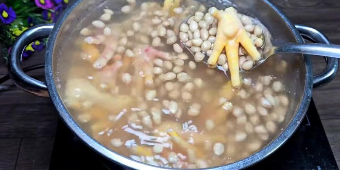 Bring to a boil, then reduce heat to medium and continue to cook until chicken feet are tender. Skim off any foam as needed.