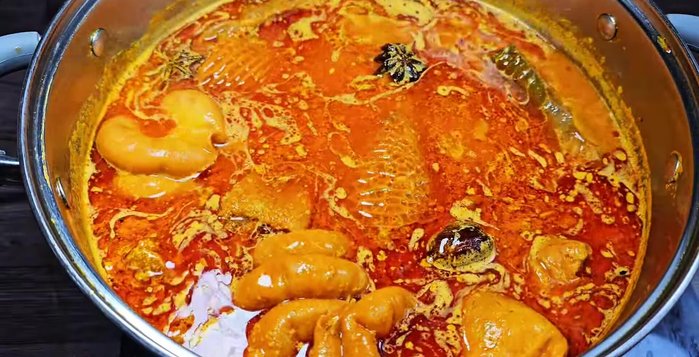 Add the remaining condensed milk and simmer for another 15 minutes.