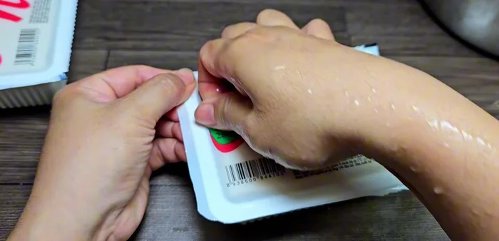 Prepare the tofu: Gently wash and cut 2 boxes of soft tofu into bite-sized pieces. Be gentle as it's soft.