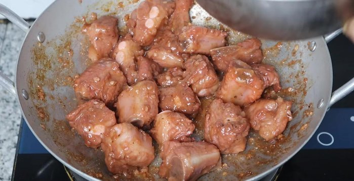 Add broth to the pan. Reduce heat and simmer until ribs are cooked through, turning occasionally for even seasoning.