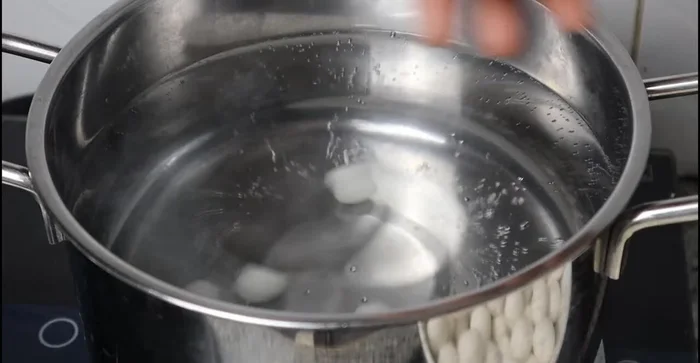 Boil the dough balls in water until they float. Let them simmer for another 5 minutes.