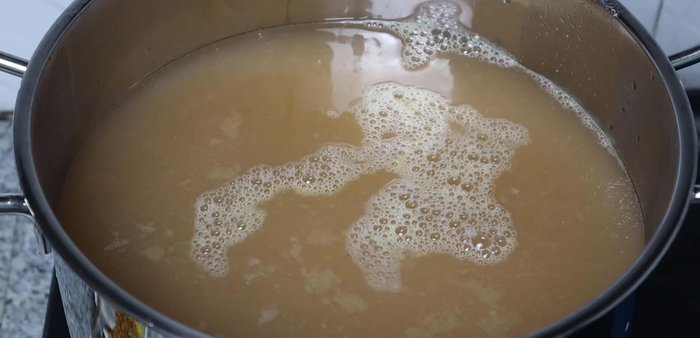 Add coconut water and additional water to the broth. Add the lemongrass and turmeric mixture, salt, sugar, and MSG. Simmer until flavors combine.