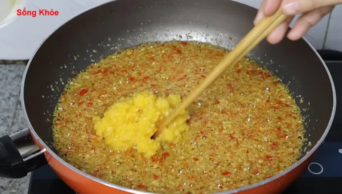 Add chopped pineapple and stir-fry for about 1 minute.