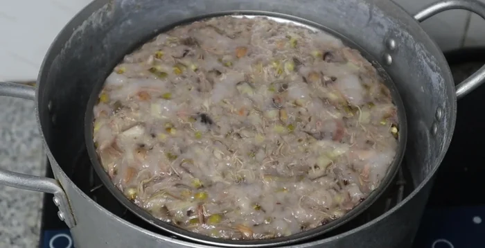 Check for doneness by inserting a toothpick; if it comes out clean, the cake is ready.