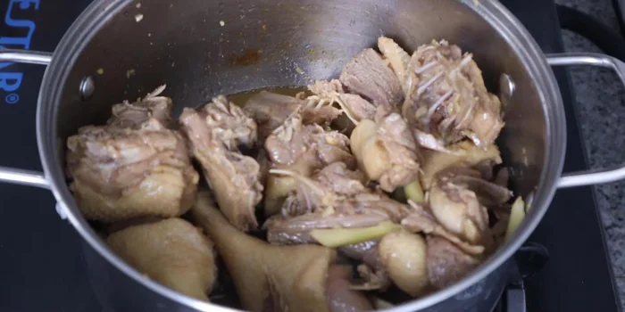 Add the coconut water (or water) and bring to a boil. Skim off any foam.