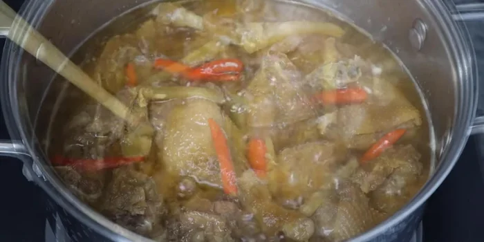 Continue simmering until the sauce has thickened and the meat is tender. Skim off excess fat from the surface if desired.