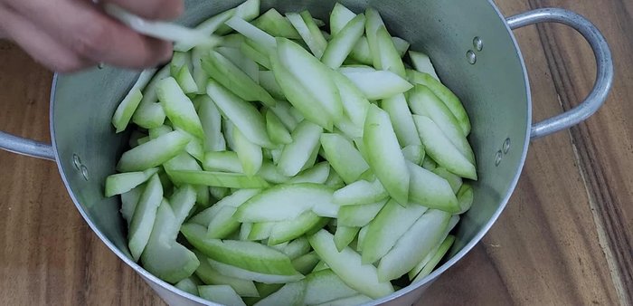 In a pot, mix winter melon with brown sugar and rock sugar. (Use all rock sugar if you don't have brown sugar).