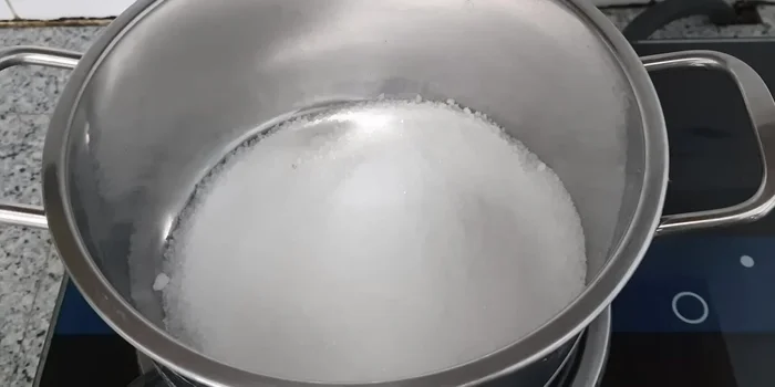 Cook sugar water with coconut milk and salt until the sugar dissolves. Let cool.