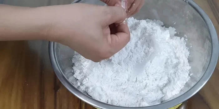 Add warm water (boiled and cooled slightly) and knead thoroughly for about 20 minutes.