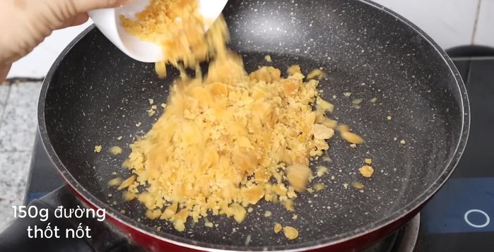 Once the sticky rice is cooked, add the sugar mixture and coconut milk. Stir-fry over low-medium heat until the sticky rice is evenly coated and thickened. (173.239)