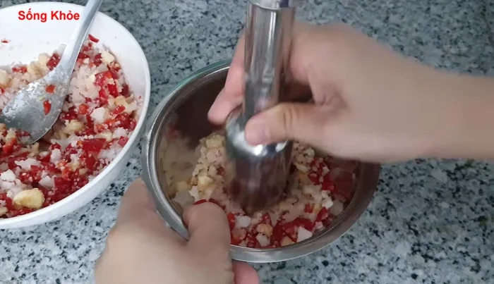 Grind the mixture using a mortar and pestle or blender until it becomes a paste.