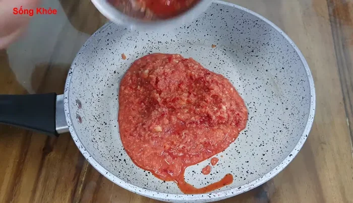Cook the mixture in a pan over low heat, stirring continuously until it dries and becomes sticky. This can take around 2 days.