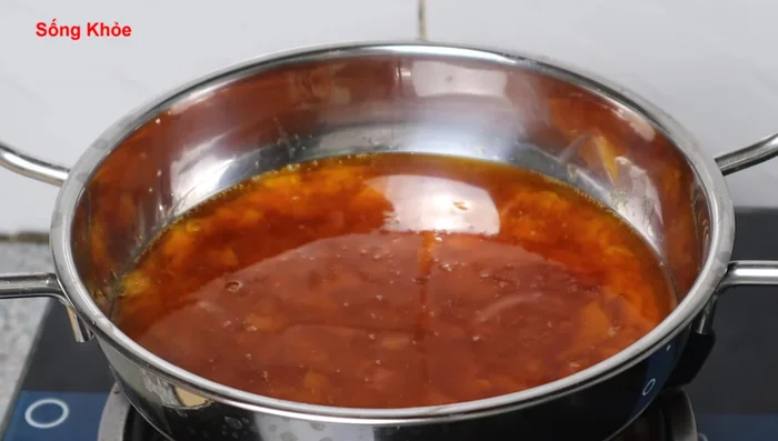 Stop stirring. Cook over low heat, gently shaking the pot occasionally to ensure even caramelization. Avoid continuous stirring.