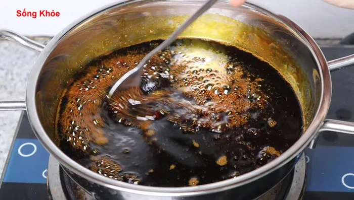 Add 0.5 teaspoon of salt to enhance flavor and longevity of the caramel. Return to low heat and stir.