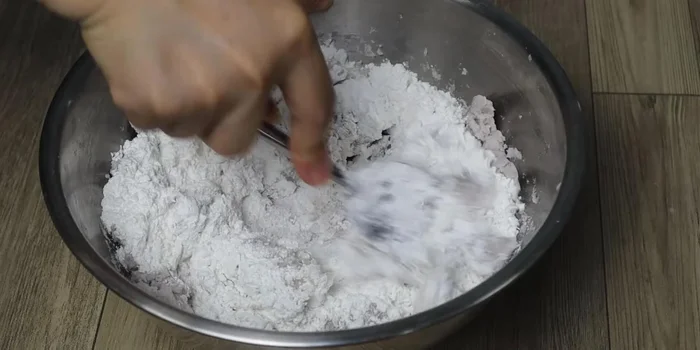 Knead the dough until smooth and supple.