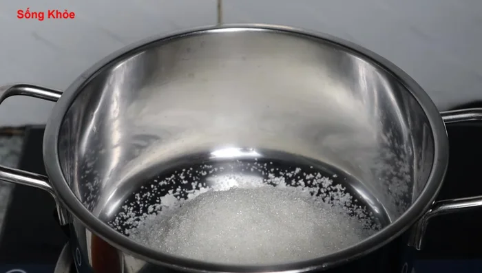 Prepare the soaking liquid: Combine sugar, filtered water, fish sauce, soy sauce, and vinegar in a pot. Cook until the sugar dissolves and the mixture boils.