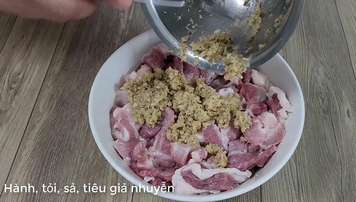 Marinate the meat with the pounded mixture, sugar, MSG, seasoning powder, fish sauce, oyster sauce, condensed milk (or honey), annatto oil, sesame oil (or cooking oil), and a little water, vinegar, or lemon juice.