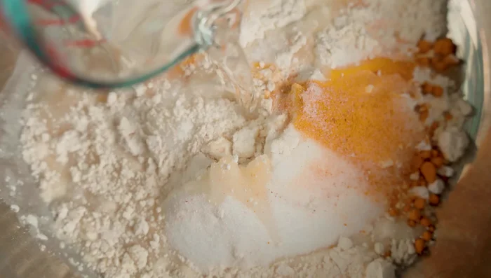 Add cold water and canned coconut milk. Stir well.