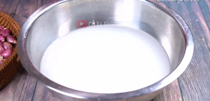 Soak onions in rice water for 8-12 hours (or overnight) to remove pungent smell and make peeling easier.