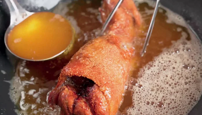 Fry until the skin is golden brown and crispy.