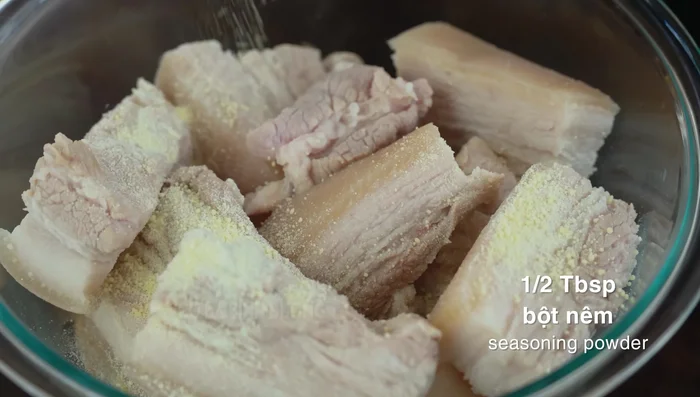 Marinate the pork belly with chicken seasoning powder, salt, sugar, fish sauce, and the chili-garlic paste for at least 15 minutes (30 minutes is recommended).