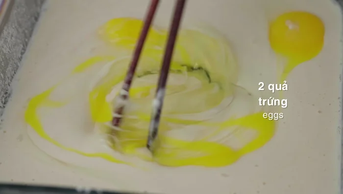 Add 2 beaten eggs to the flour mixture.