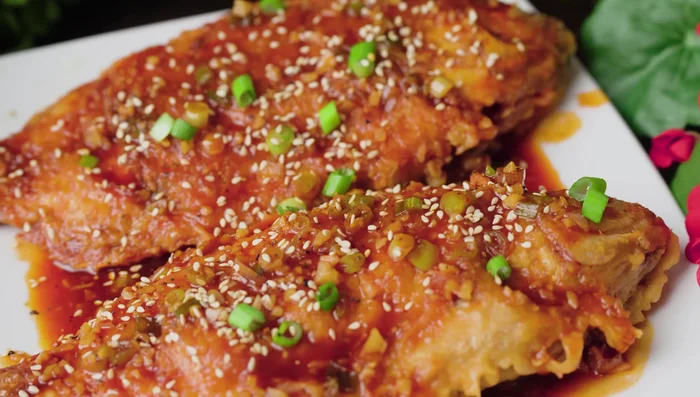 Garnish with sesame seeds and green onions (optional).