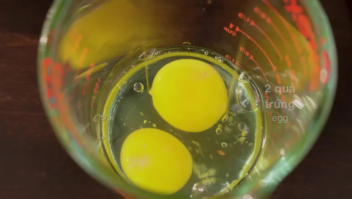 Beat two eggs and add them to the marinated fish. Mix well.