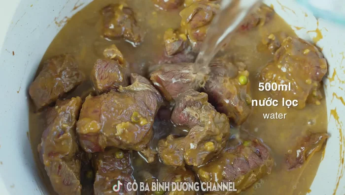 Add coconut water, filtered water, and remaining shallots. Bring to a boil, skim off foam, then simmer on medium-low heat until beef is tender.