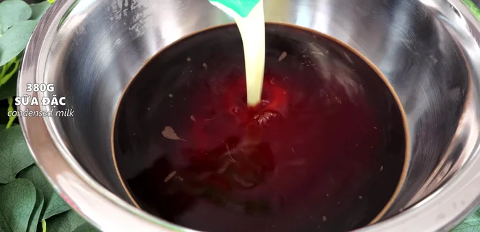 Add condensed milk to the hot tea and stir.