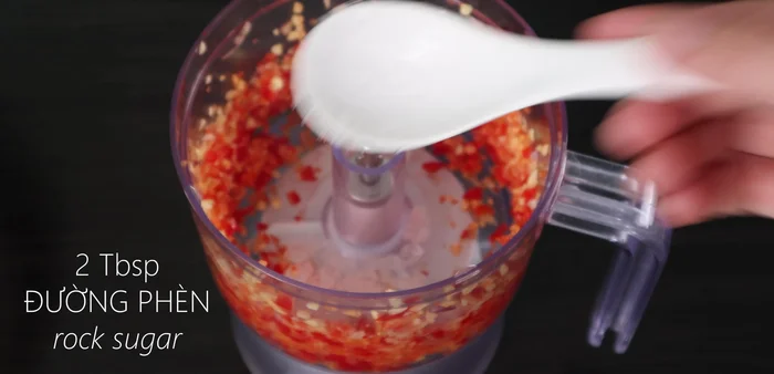 Mix the blended mixture with rock sugar, fish sauce, and caramel.