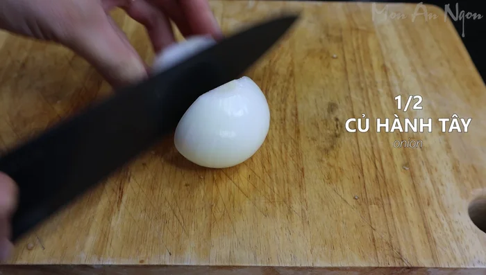 Finely chop half an onion and the green onion leaves. (112.92)