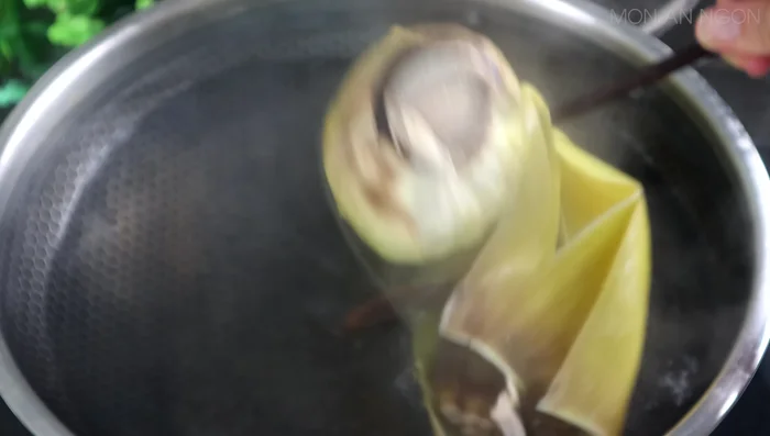 Remove banana stems from boiling water, rinse with cold water, and let cool.