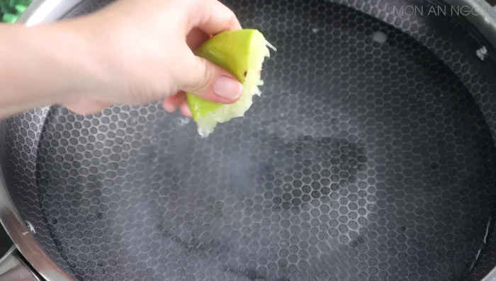 Boil banana stems in water with lemon juice (or vinegar) and salt until tender (approx. 30 mins).