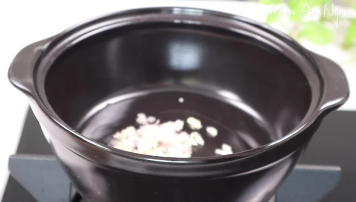 Heat cooking oil and sauté garlic and shallots until slightly yellow.