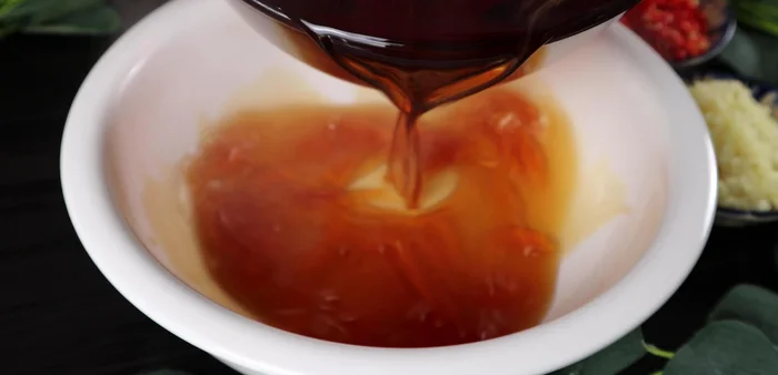 Pour the fish sauce into a bowl to cool completely.