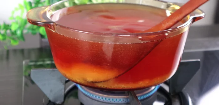 Cook the mixture over medium heat, stirring gently to prevent burning.