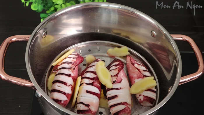 Once the squid is cooked, remove it from the steamer.