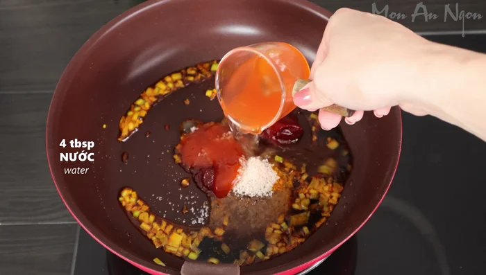 Add 4 tablespoons of water and simmer until the sauce thickens and the color is consistent.
