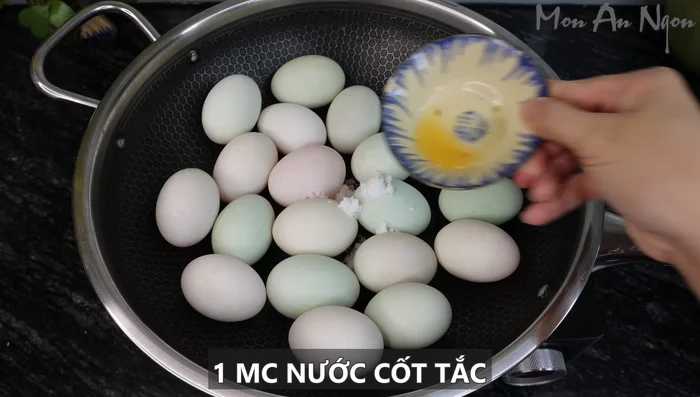 Boil duck eggs with salt and lime juice/vinegar for 7 minutes, then add quail eggs and boil for another 3 minutes. Immediately transfer to cold water to cool and peel.