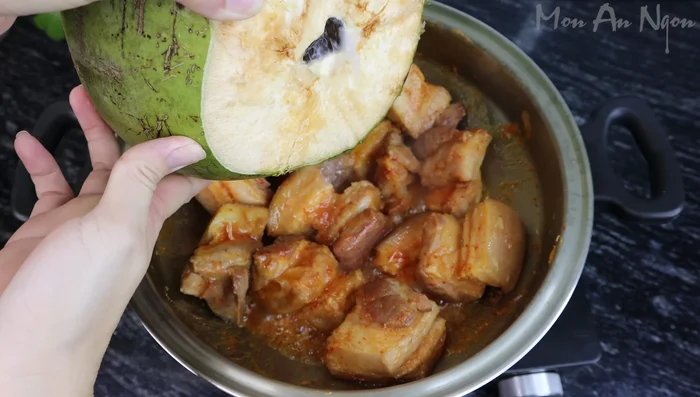 Add fresh coconut water, then the peeled duck and quail eggs.