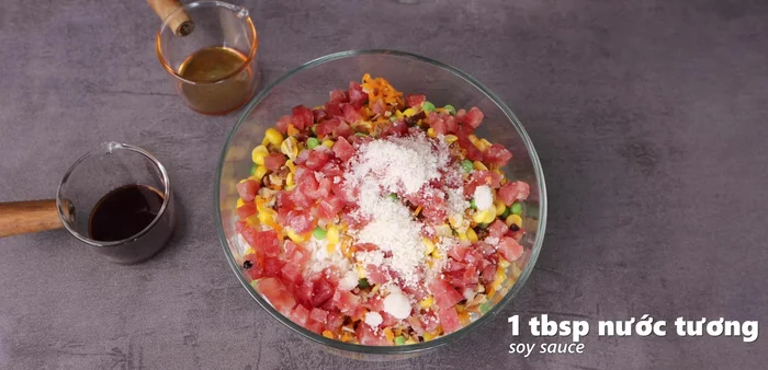 Add seasoning, sugar, soy sauce, sesame oil, and oyster sauce. Mix all ingredients thoroughly.