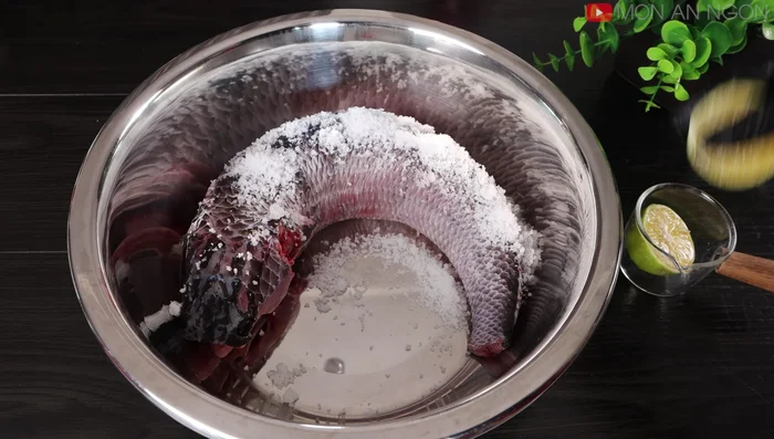 Clean the fish thoroughly with salt and lemon to remove slime.